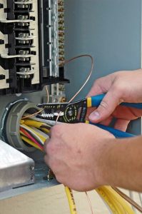 electrician-working-on-electrical-panel