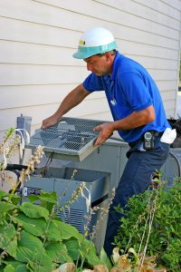 technician-working-on-ac-unit