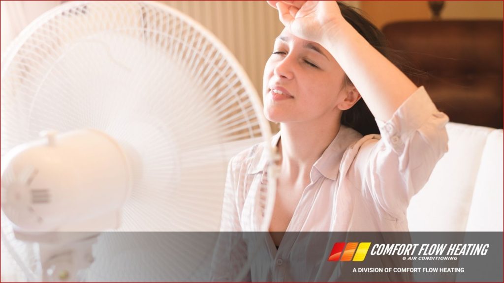 A women sweating in her house.
